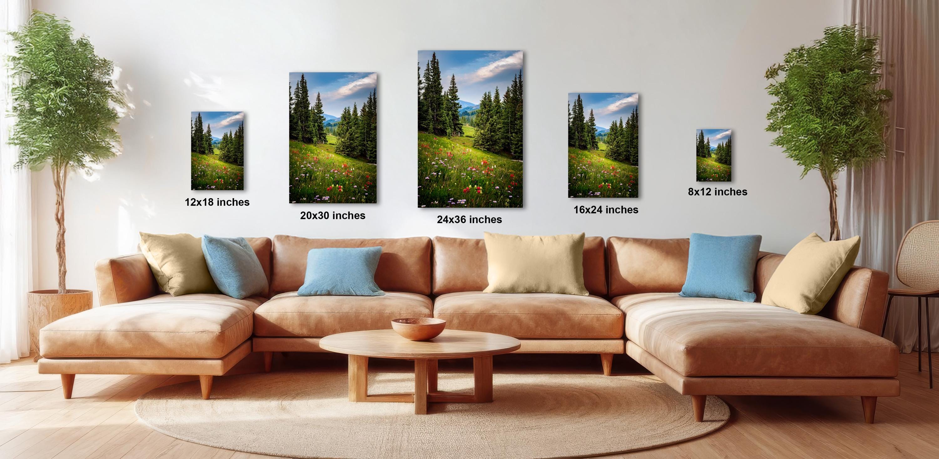 a living room filled with furniture and paintings