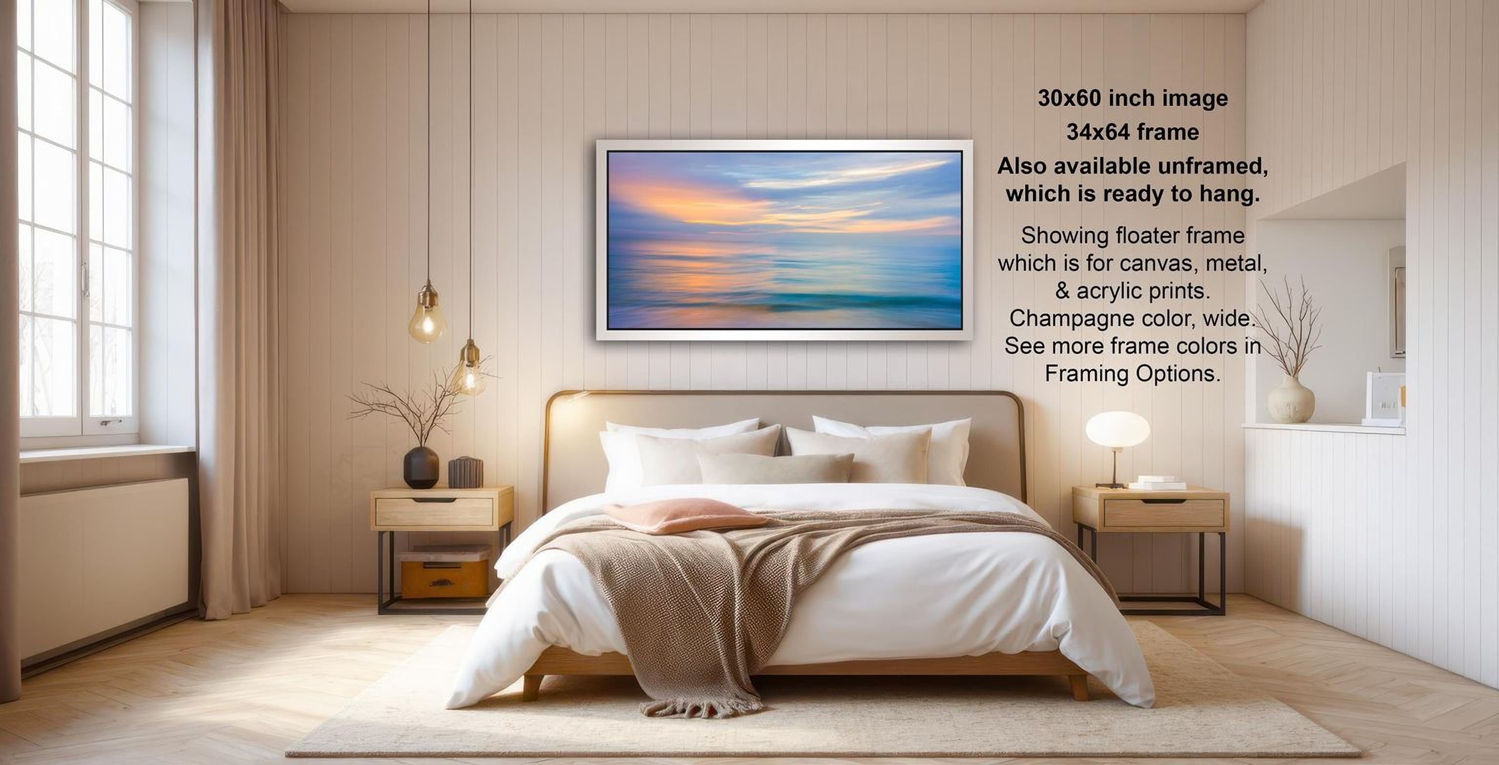 The image is a bedroom with a large bed, a nightstand, and a painting hanging on the wall. The painting depicts a sunset over the ocean. The bedroom has a minimalist and modern design, with white walls, a wooden floor, and a large window providing natural light.