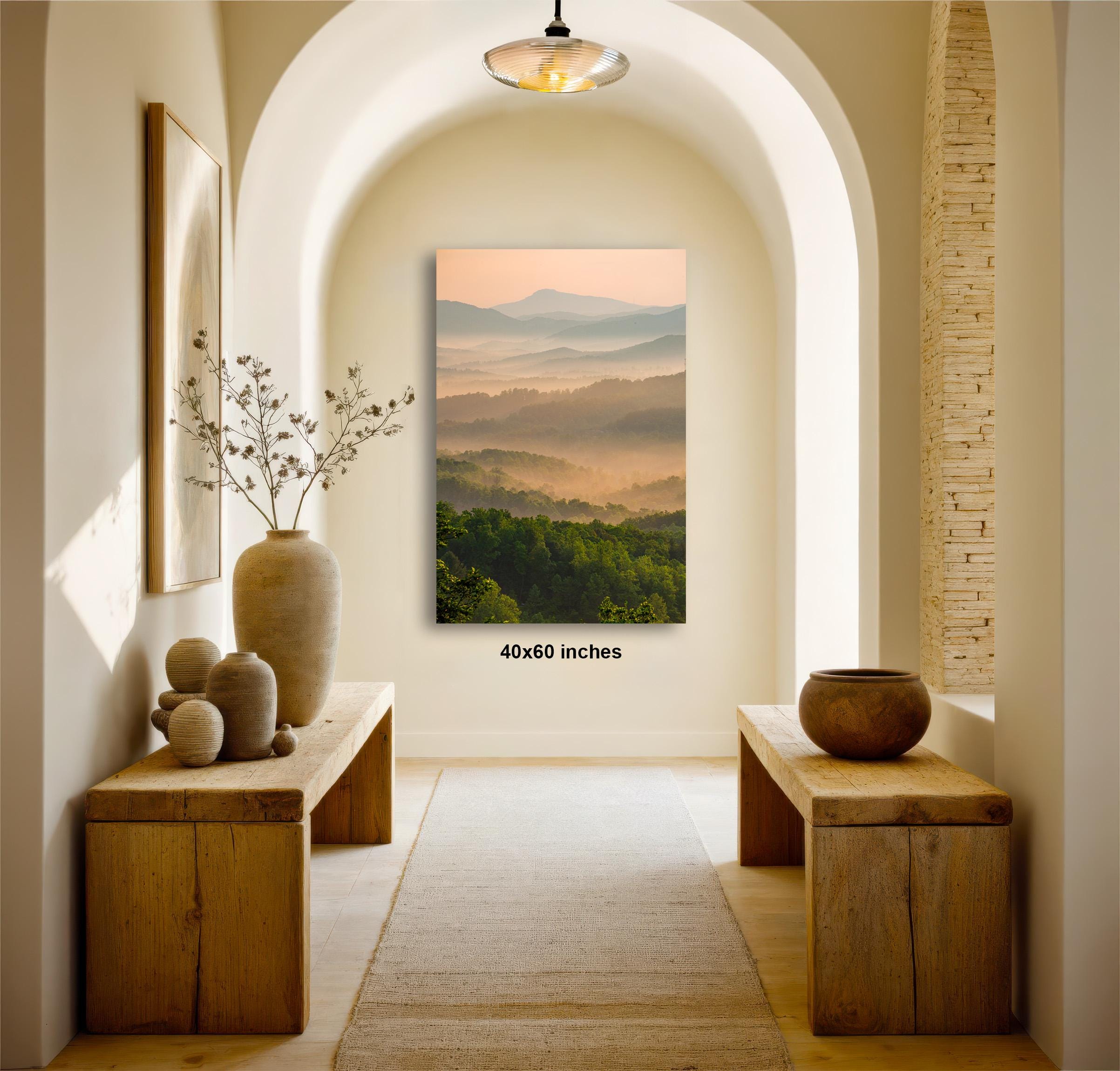 a serene and inviting hallway with a large painting of a mountain landscape hanging on the wall. The painting is framed in a wooden frame and measures 4060 inches in size. The hallway features wooden benches and tables, as well as decorative elements such as a vase and a bowl. The overall atmosphere of the hallway is calm and peaceful, with the natural beauty of the mountain landscape providing a soothing backdrop.