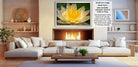 a cozy living room with a large white sectional sofa, a wooden coffee table, and a fireplace with a fire burning. The room is decorated with various vases, potted plants, and other home decor items, creating a warm and inviting atmosphere.
