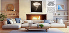 The image is a modern living room with a fireplace, white sofas, and various decorative elements such as vases and a potted plant.