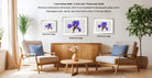 a modern living room with a wooden coffee table, two chairs, and three framed photographs of purple flowers on the wall.