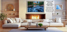 a cozy living room with a fireplace, white sofas, and a coffee table. The room has a warm and inviting atmosphere, with a fireplace providing a focal point and a painting hanging on the wall.