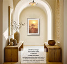 a serene indoor setting with a wooden table, a vase of flowers, and a framed picture of a horse in a sunset. The image is described as a 24x36 inch picture with a 2-inch frame width and a 3-inch mat, and it is framed in a size of 34x46. The image showcases a contemporary frame style, and it is described as a champagne color, suggesting that it is a high-quality print.