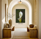 a serene and elegant hallway with a large framed photograph of a white lily on the wall, flanked by two wooden benches and a vase of flowers.