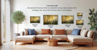 a living room with a large sectional sofa, a coffee table, and a potted plant. There are four framed landscape paintings displayed on the wall, each with a different frame size ranging from 16" to 20" inches. The paintings depict various scenes, including a forest, a beach, and a mountain landscape. The arrangement of the paintings and the overall layout of the room create a cozy and inviting atmosphere.