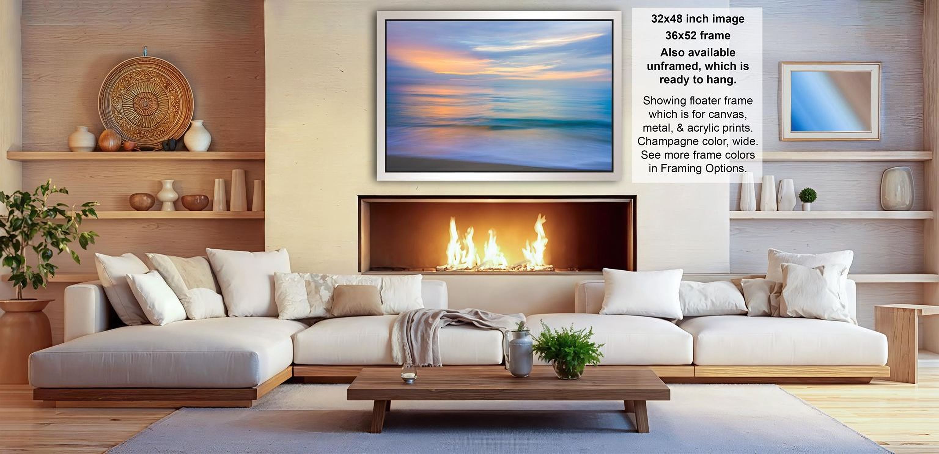 a cozy living room with a fireplace, white sofas, and a coffee table. The room has a warm and inviting atmosphere, with a fireplace providing a focal point and a large framed picture hanging on the wall.