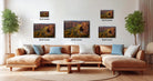 a living room with a large sectional sofa, a coffee table, and several framed landscape photographs displayed on the wall.