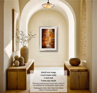 The image is a photograph of a hallway with a framed artwork hanging on the wall, wooden tables, and decorative items such as vases and a plant.