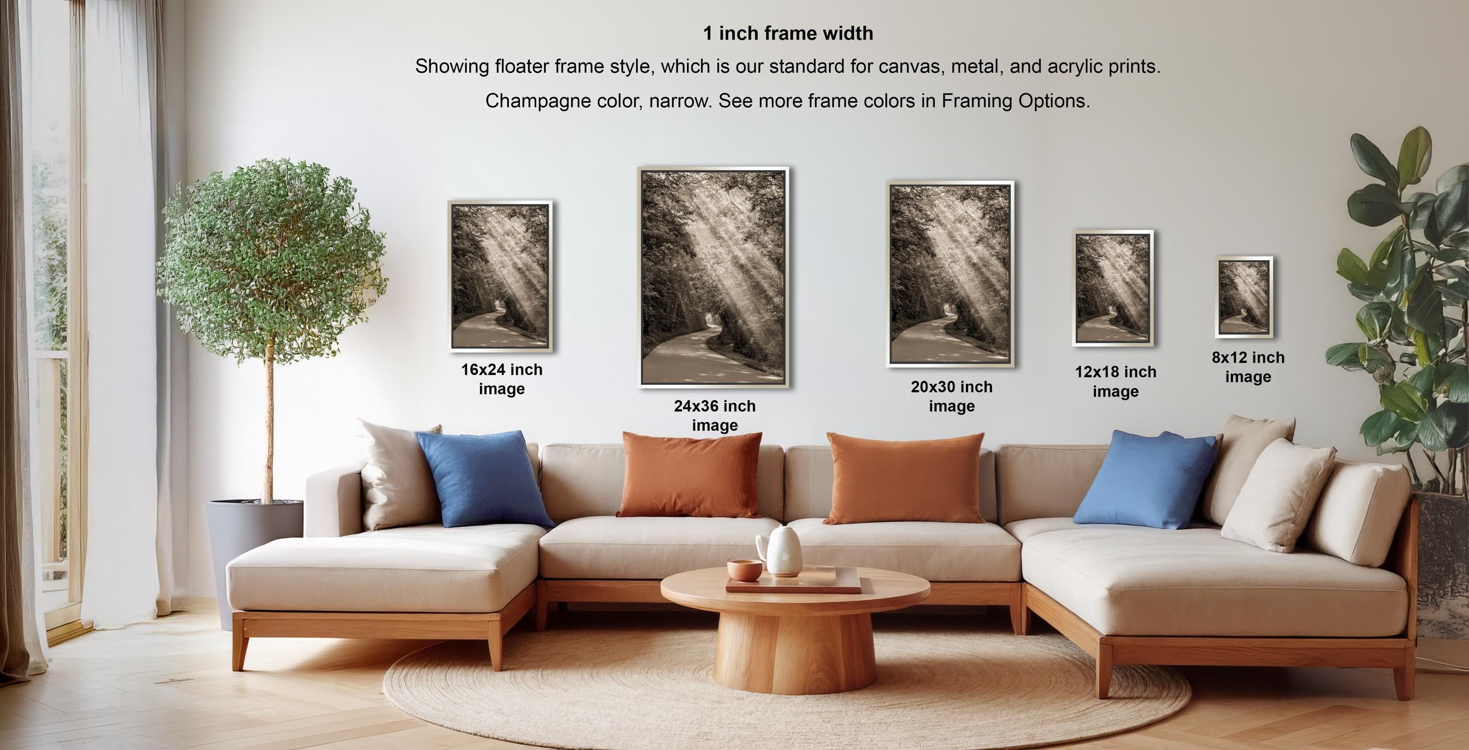 a living room with a large sectional sofa, a coffee table, and various decorative elements such as a potted plant and a vase. The room has a modern and minimalist design, with a focus on neutral colors and clean lines.