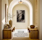 The image is a 32x48-inch framed photograph of a black and white abstract image hanging on a wall in a hallway.