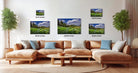 a large, brown sectional sofa with multiple pillows, a wooden coffee table, and a potted plant in the background. Above the sofa, there are three framed landscape photographs of varying sizes, each depicting a different scene. The photographs are arranged in a row on the wall, with the largest one being 24 inches in height and the smallest one being 12 inches in height.