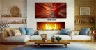 a cozy living room with a fireplace, a large framed photograph of a canyon, and a wooden coffee table.