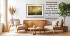a cozy living room with a wooden coffee table, two beige armchairs, and a framed photograph of a forest scene hanging on the wall.