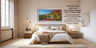 The image is a bedroom with a large bed, a nightstand, and a painting of a scenic mountain landscape hanging on the wall. The painting is framed in a frame that is ready to hang.