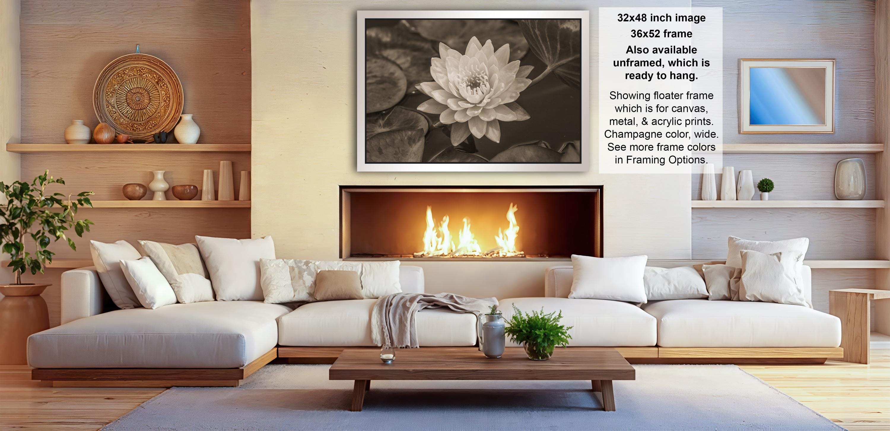 a cozy living room with a fireplace, white sofas, and various decorative elements such as vases and a potted plant.