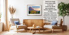 a living room with a wooden coffee table, two white armchairs, and a framed landscape painting hanging on the wall.
