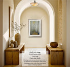 a hallway with a framed painting of a forest scene hanging on the wall. The painting has a 2-inch frame width and a 3-inch mat size. The hallway features wooden benches and decorative vases, creating a warm and inviting atmosphere.