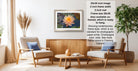 a living room with a wooden coffee table, two white armchairs, and a framed photograph of a flower on the wall.