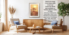 a living room with a framed picture of a sunset on the wall, a wooden coffee table, two armchairs, and a potted plant.