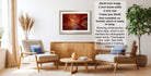 a modern living room with a wooden coffee table, two white armchairs, and a framed photograph of a red rock formation hanging on the wall.