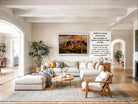The image is a large, high-quality photograph of a living room with a large sectional sofa, a coffee table, and various decorative elements such as potted plants and vases.