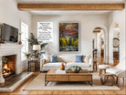 a cozy living room with a fireplace, a large window, and a comfortable white sofa. The room is decorated with various plants and has a wooden coffee table in the center. There is a television on the wall, and the room appears to be well-lit and inviting.