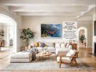 The image is a large, high-quality photograph of a mountainous landscape, featuring a stunning view of the ocean and a dramatic cliff face. The photograph is framed and ready for display, showcasing the natural beauty of the scene.
